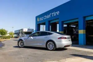 EV Vehicle in front of Big Chief Tire