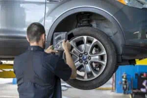 man fixing a tire