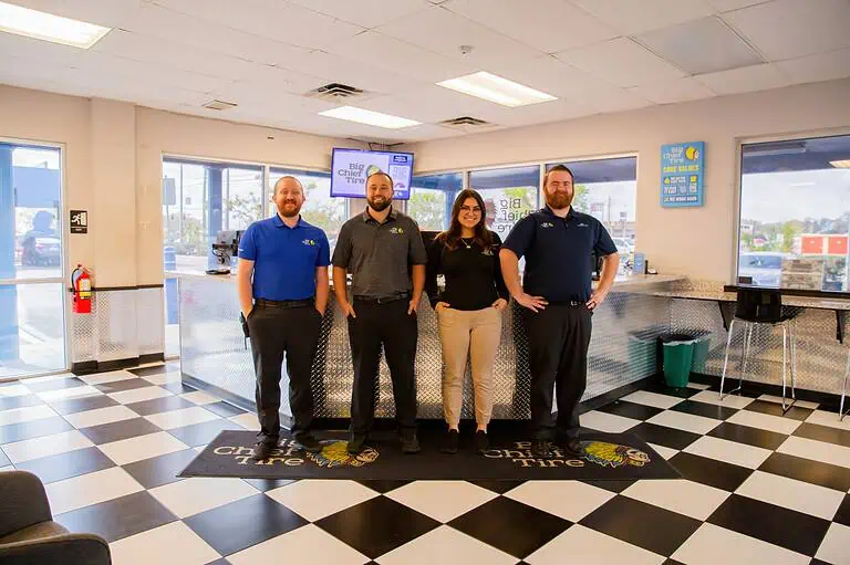 BCT employees standing in front of customer service desk